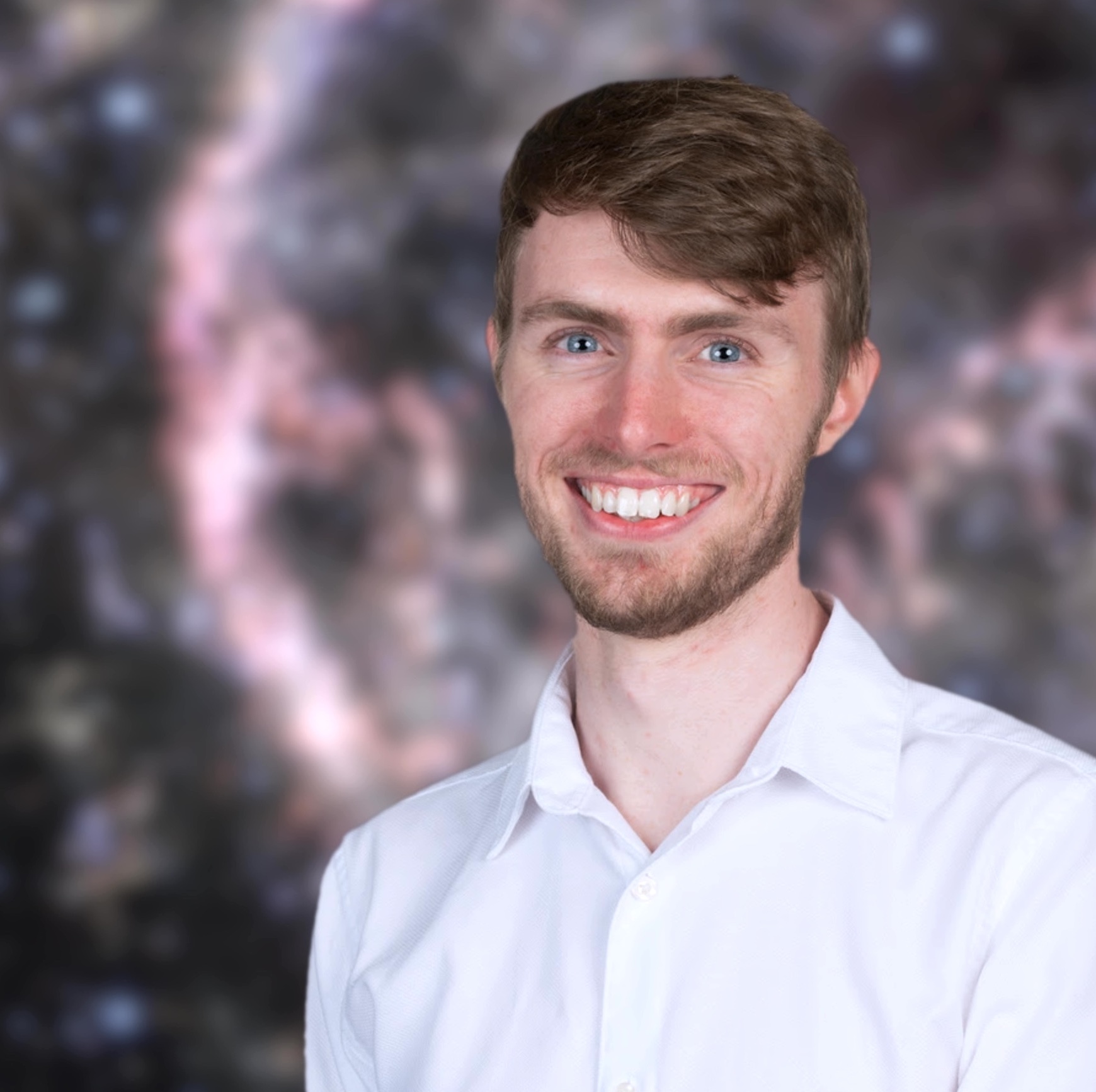 Profile photo, out of focus galaxy in the background.